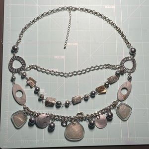 Three tiered necklace, 24 to 27 inch neck.